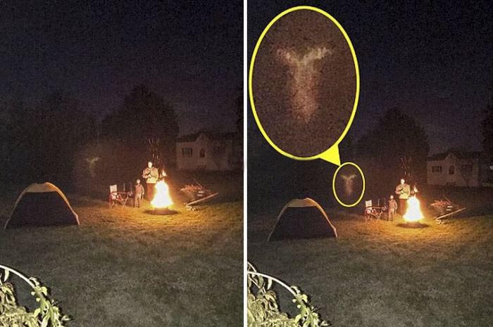Fotografie anděla vznášejícího se vedle chlapce