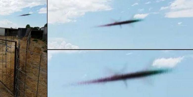 UFO jako doutník jako UFO letělo nad farmou velkou rychlostí.